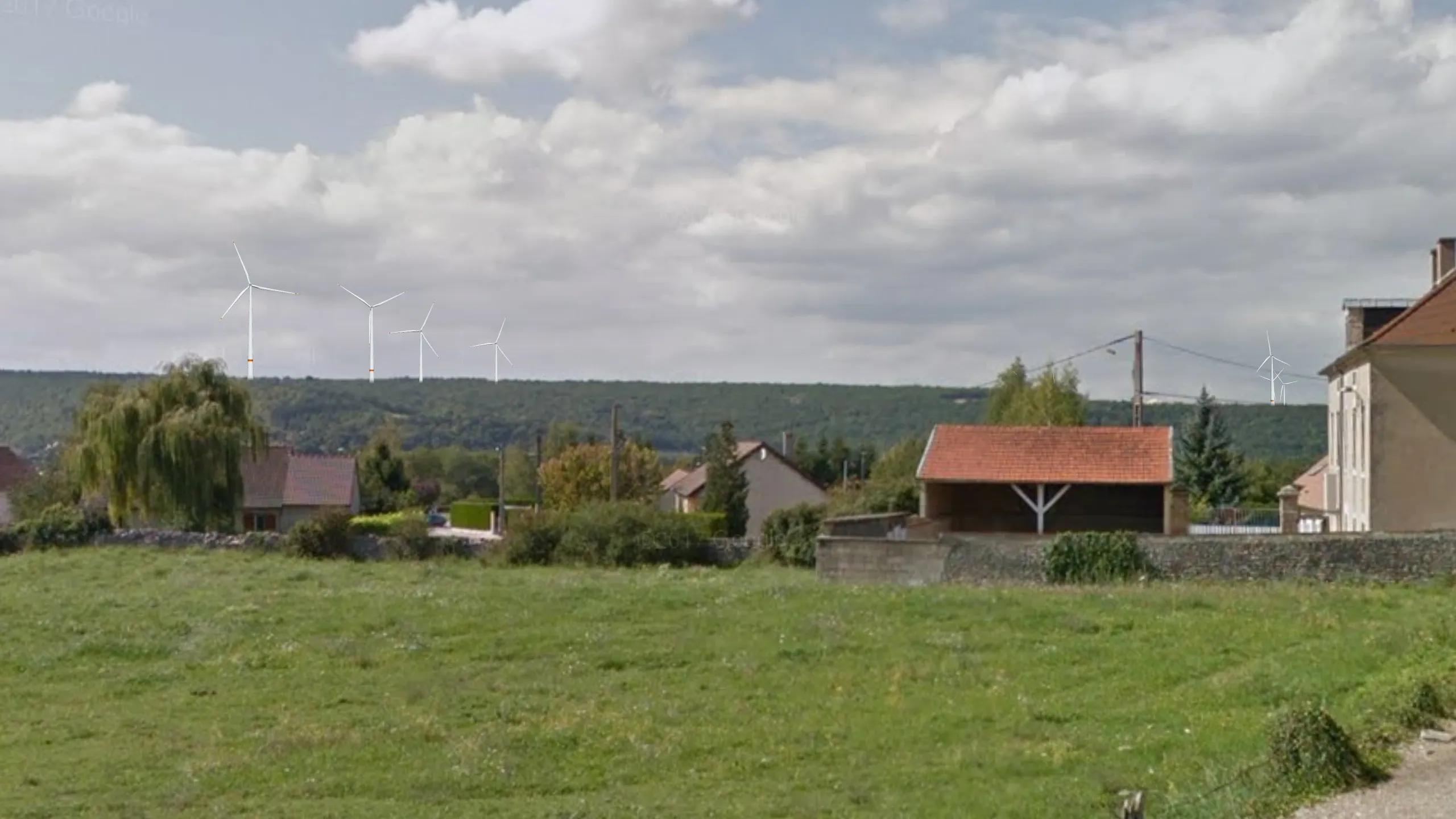 Photomontage made from a Google Streetview image, showing wind turbines in the landscape
